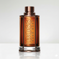 Hugo Boss The Scent men's perfume bottle on a reflective surface with a light gray background