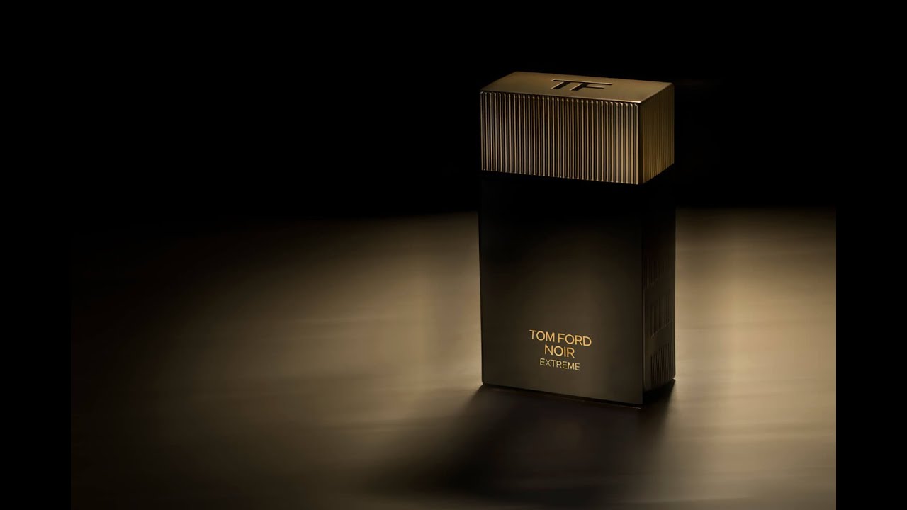 Tom Ford Noir Extreme perfume bottle on a dark background